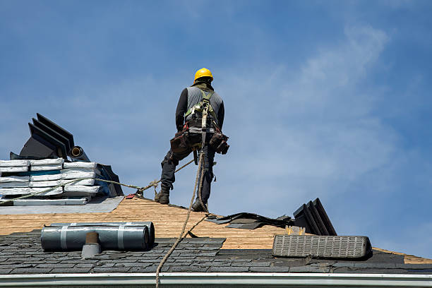 Professional Roofing technician working in Nashua, NH